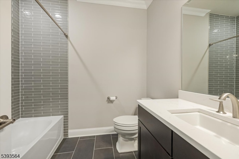 205 Mariners Pointe Hopatcong, NJ 07843 - Photo 20 of 31 a bathroom with a sink a toilet and shower