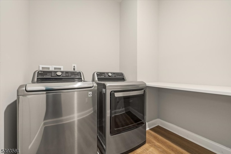 205 Mariners Pointe Hopatcong, NJ 07843 - Photo 22 of 31 a utility room with dryer and washer