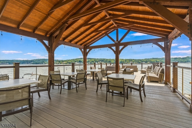 205 Mariners Pointe Hopatcong, NJ 07843 - Photo 28 of 31 a view of a dining room with furniture and window