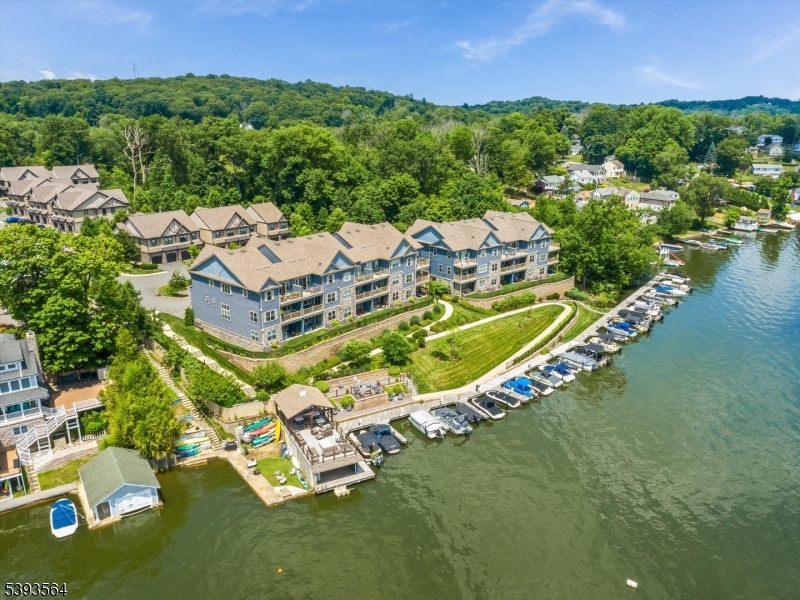 205 Mariners Pointe Hopatcong, NJ 07843 - Photo 30 of 31 an aerial view of a house with a garden and lake view