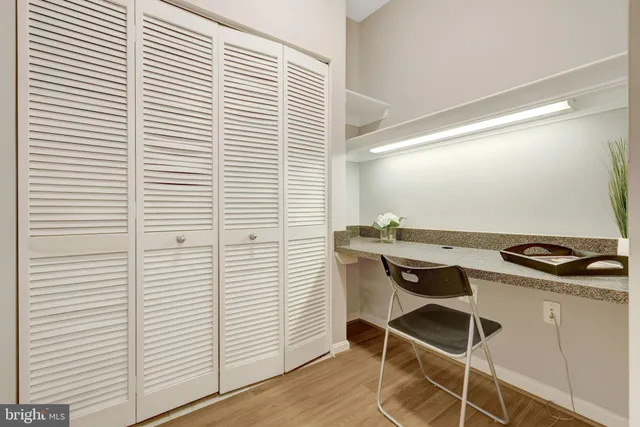 a room with a table and chairs