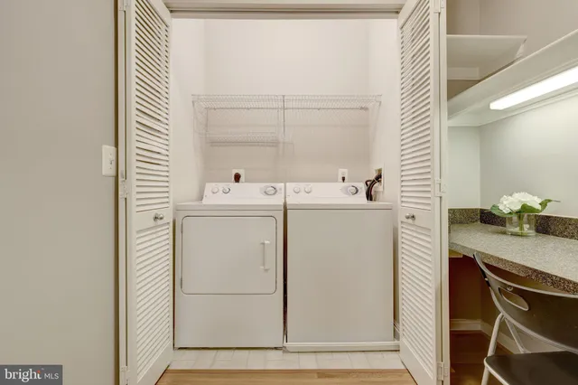 a picture of a bathroom with a white wall and a white wall