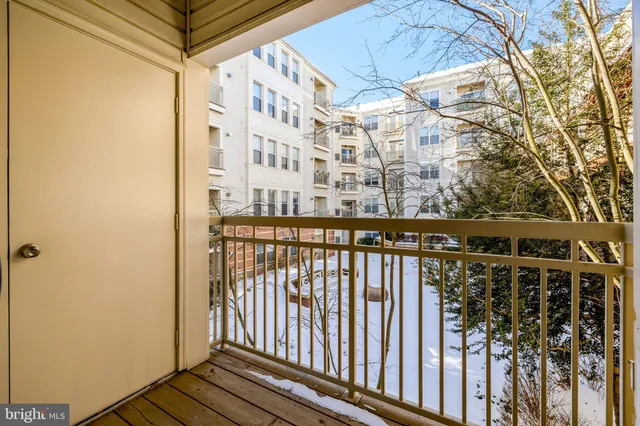 a view of balcony with wooden floor