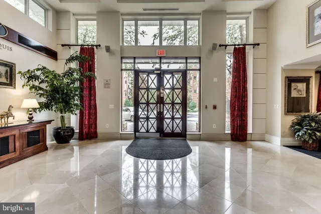 a room with furniture and gym equipment