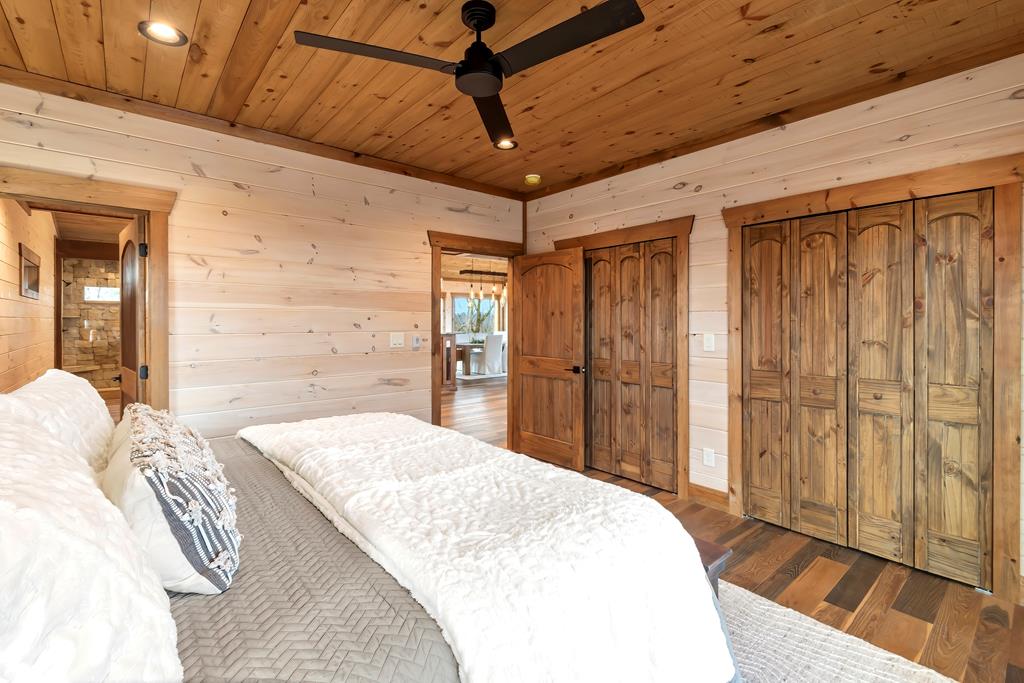 470 Skylight Drive Blue Ridge, GA 30513 - Photo 25 of 83 a spacious bedroom with a bed and a shower