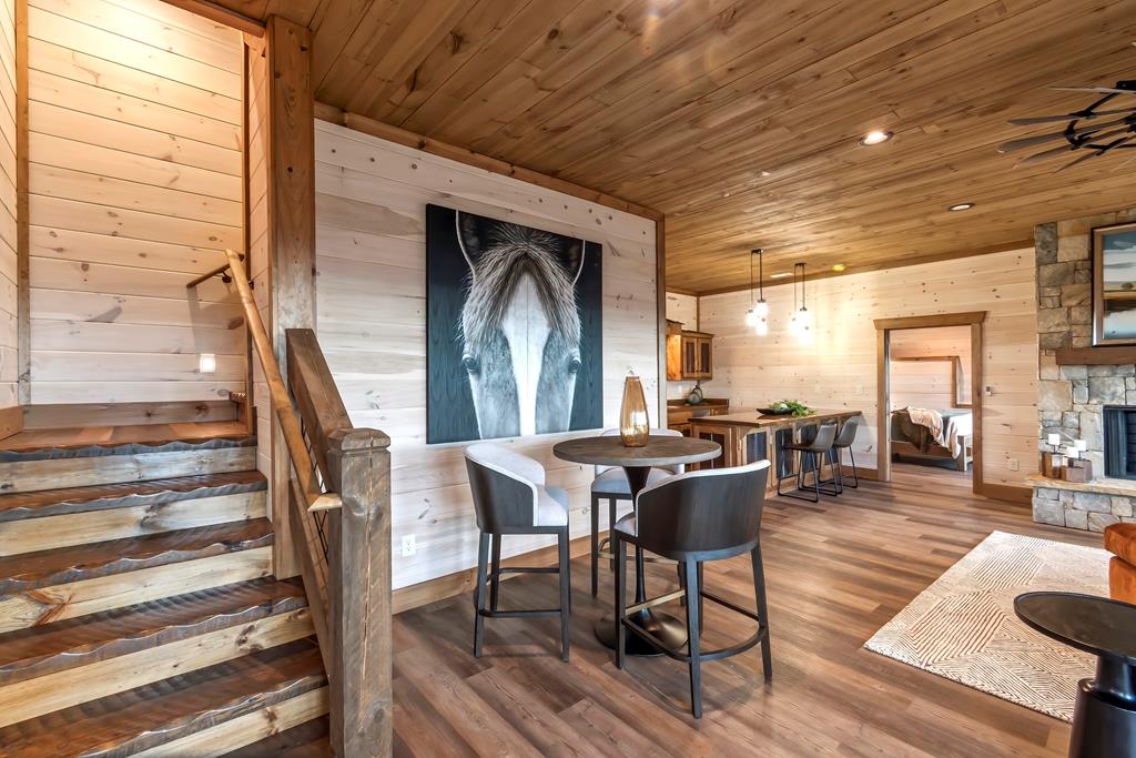 470 Skylight Drive Blue Ridge, GA 30513 - Photo 53 of 83 a view of a dining room with furniture window and wooden floor