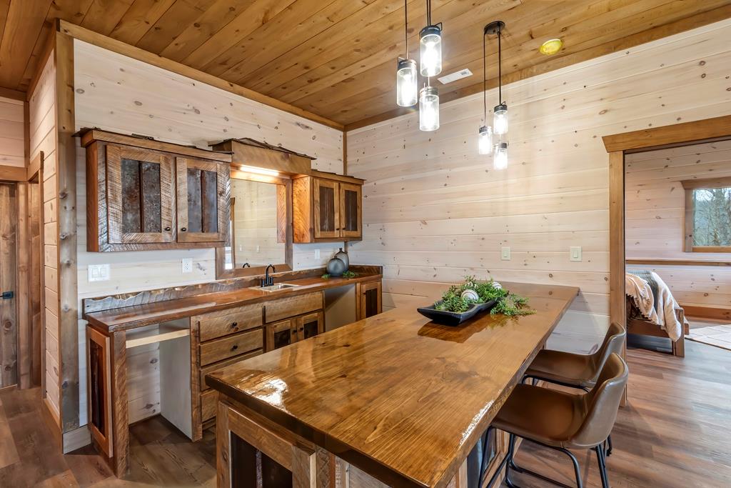 470 Skylight Drive Blue Ridge, GA 30513 - Photo 58 of 83 a dinning table and chairs in the patio