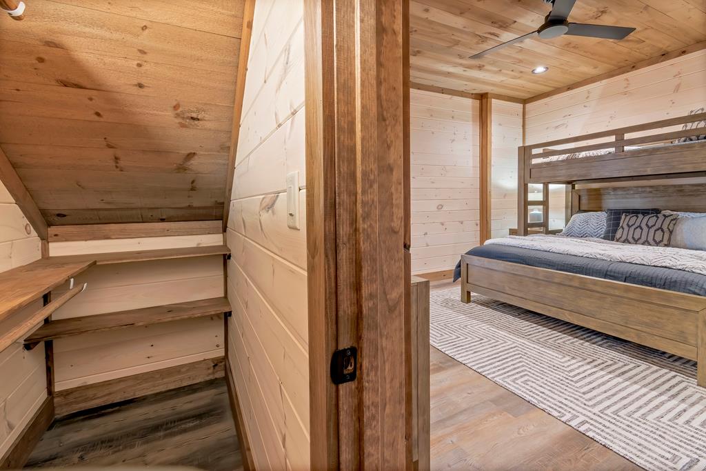 470 Skylight Drive Blue Ridge, GA 30513 - Photo 71 of 83 a bedroom with a bed and the view of a bathroom