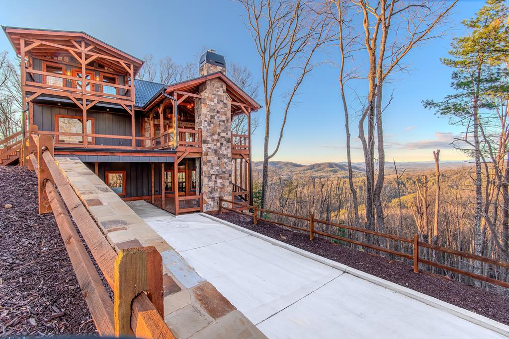 470 Skylight Drive Blue Ridge, GA 30513 - Photo 76 of 83 a view of a house with wooden fence