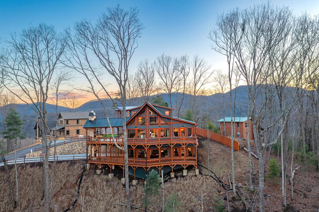 470 Skylight Drive Blue Ridge, GA 30513 - Photo 79 of 83 a wooden bench sitting in front of a house