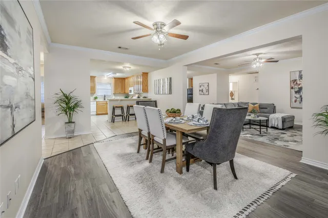 a view of a dining room with furniture