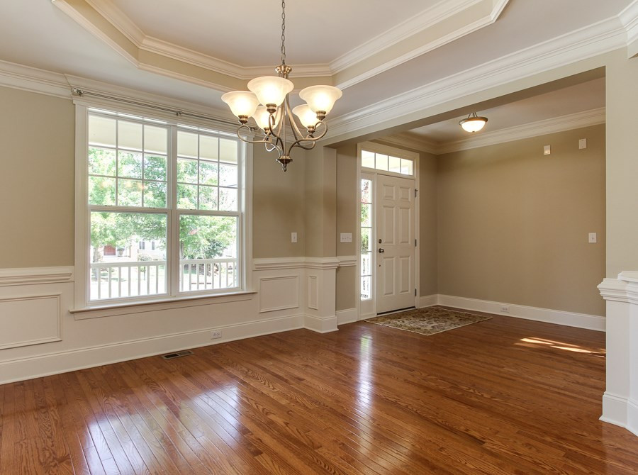 Open And Bright. Fresh Neutral Paint And Hardwood Floors. Formal Dining Room