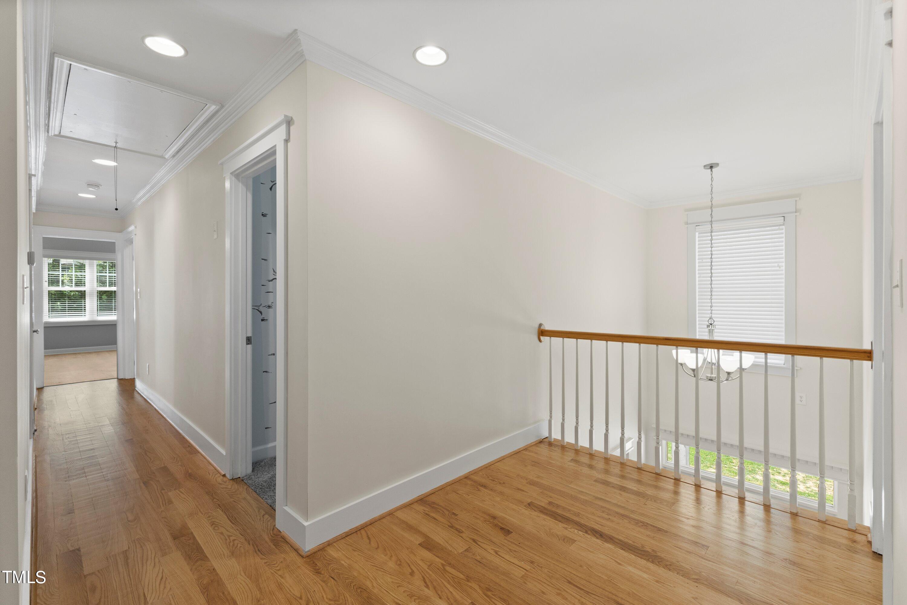 7408 Lakefall Drive Wake Forest, NC 27587 - Photo 26 of 65 a view of hallway with wooden floor