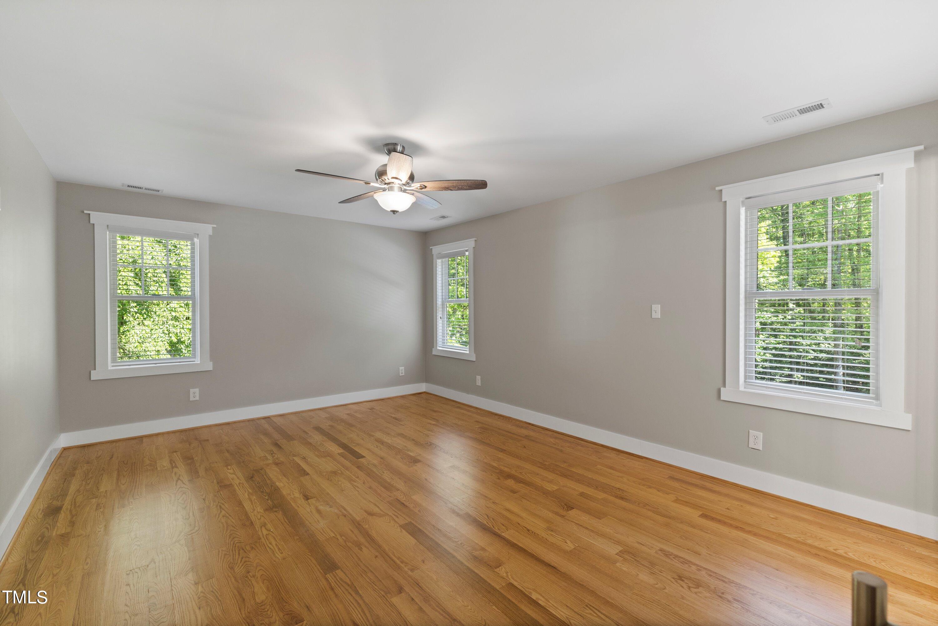 7408 Lakefall Drive Wake Forest, NC 27587 - Photo 27 of 65 a view of an empty room with a window