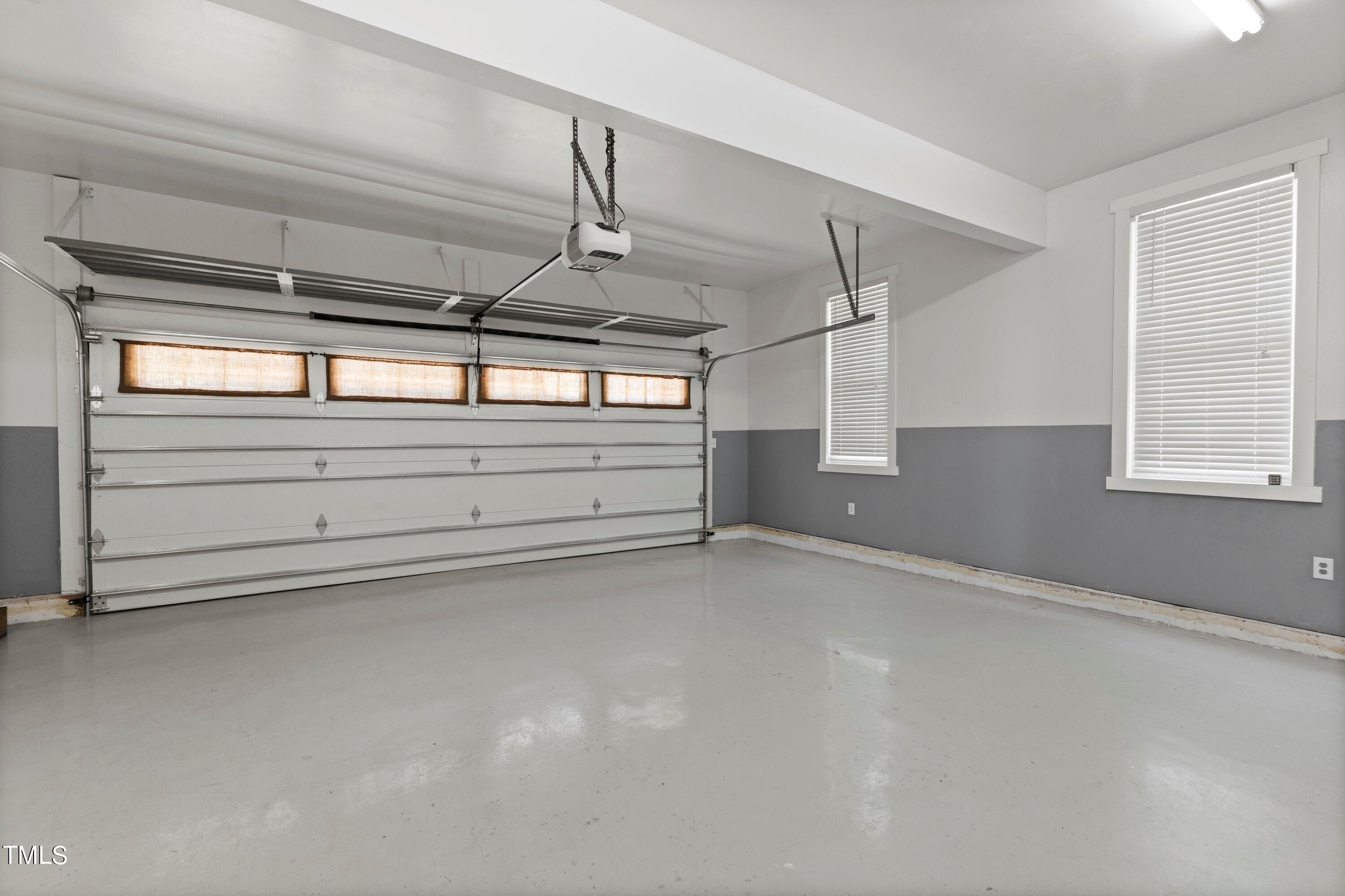 7408 Lakefall Drive Wake Forest, NC 27587 - Photo 44 of 65 a view of an empty room with a window