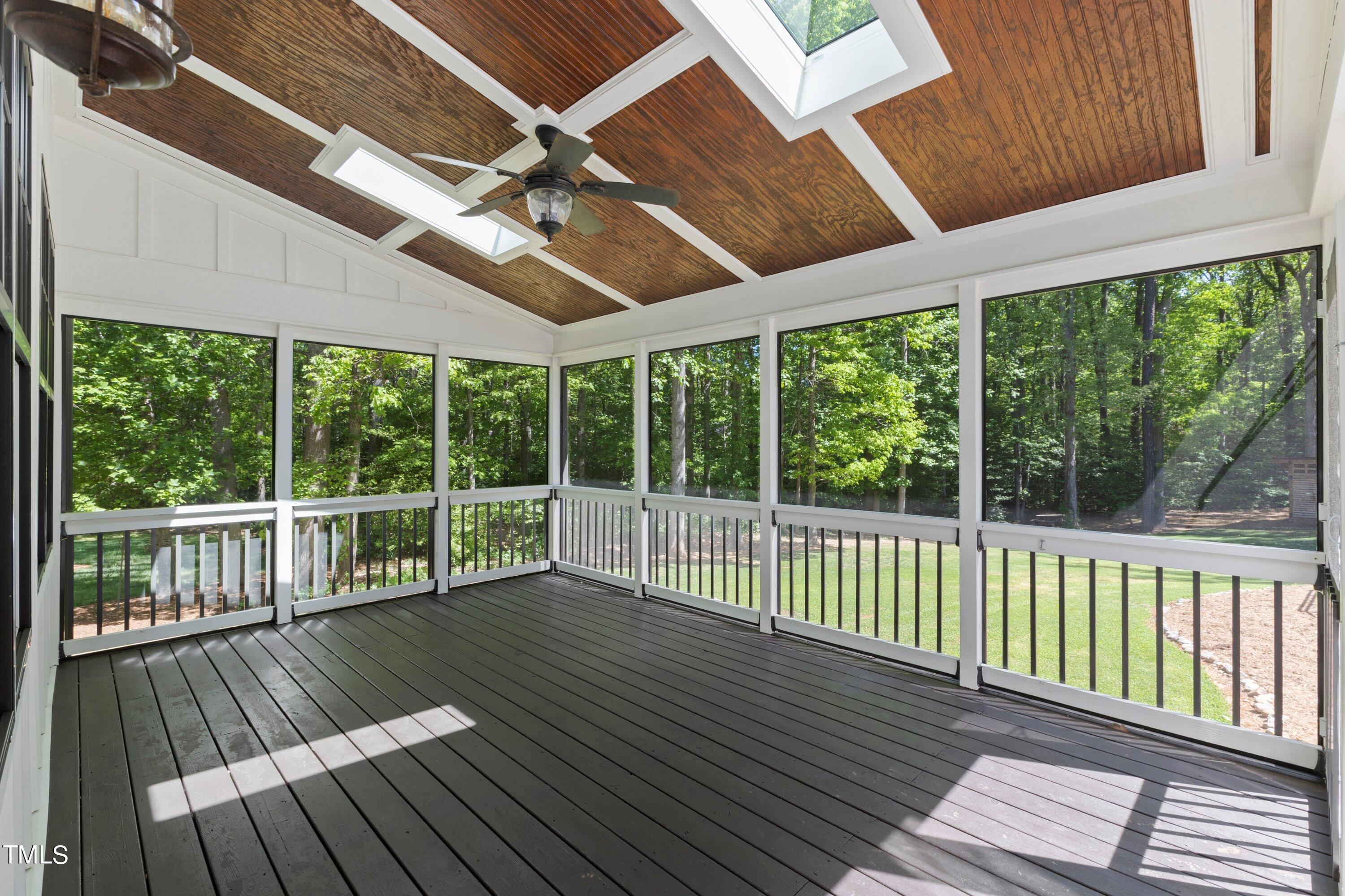 7408 Lakefall Drive Wake Forest, NC 27587 - Photo 46 of 65 a view of a wooden deck