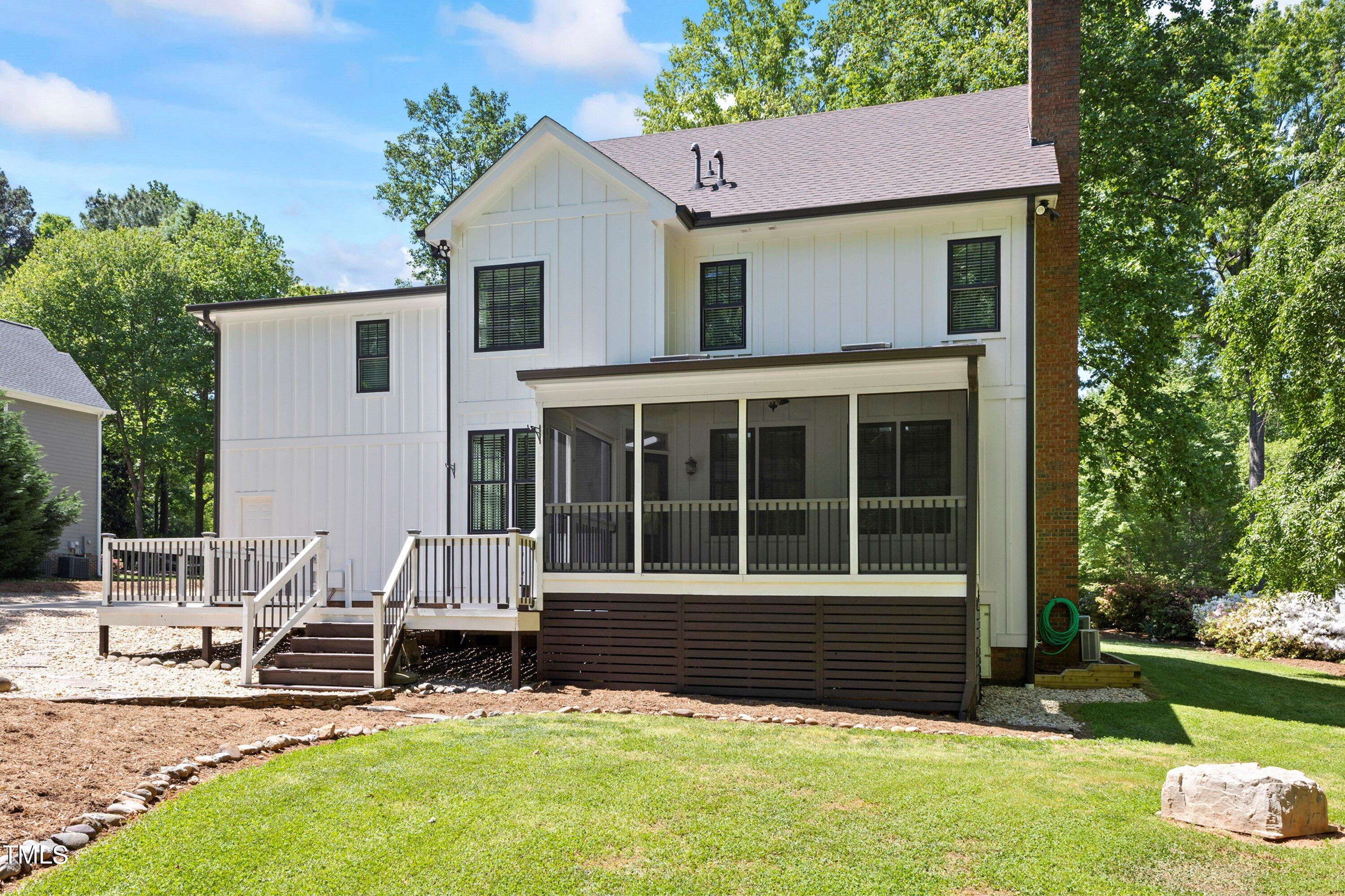 7408 Lakefall Drive Wake Forest, NC 27587 - Photo 51 of 65 a view of house with backyard space and garden