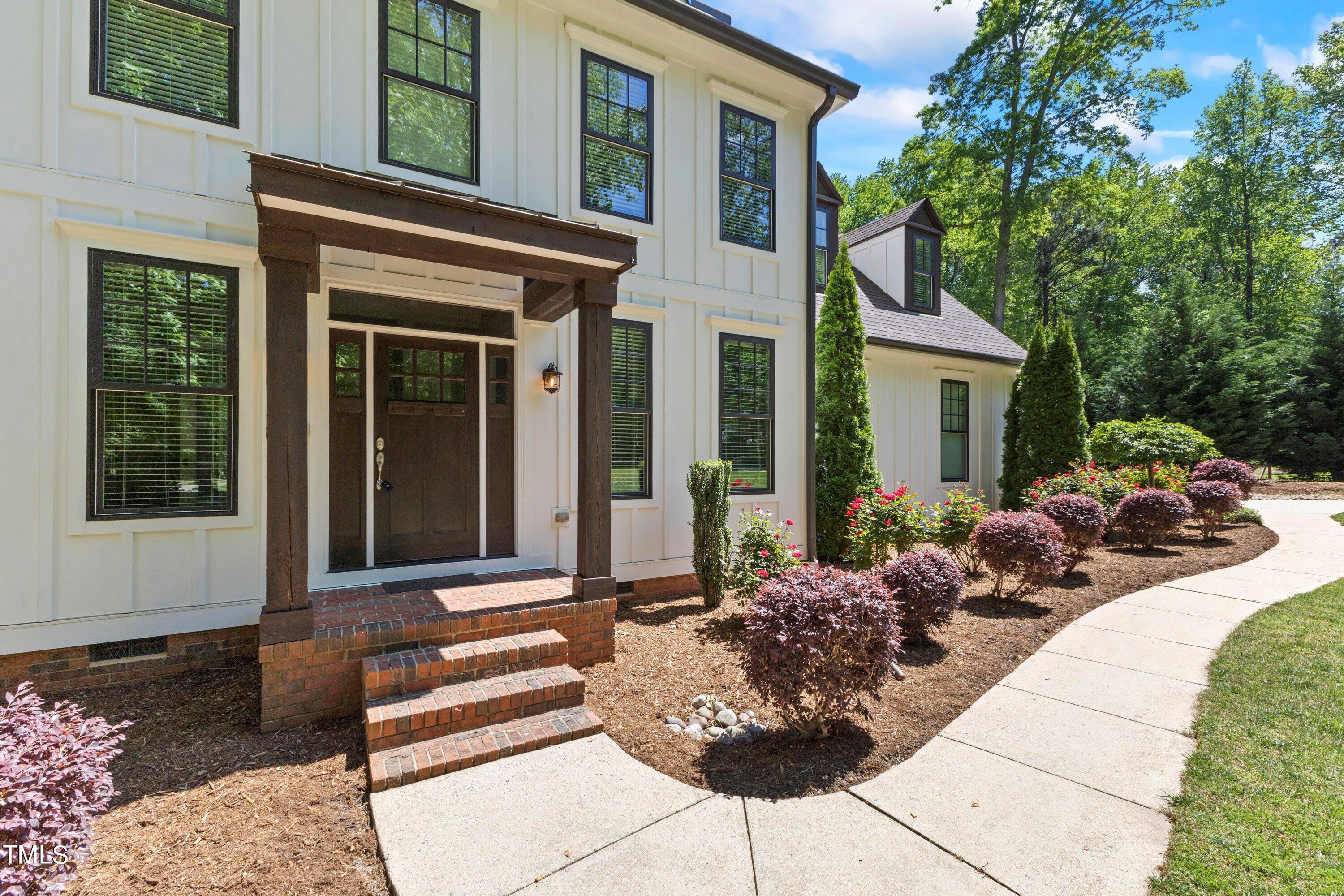 7408 Lakefall Drive Wake Forest, NC 27587 - Photo 6 of 65 a view of a house with backyard and sitting area