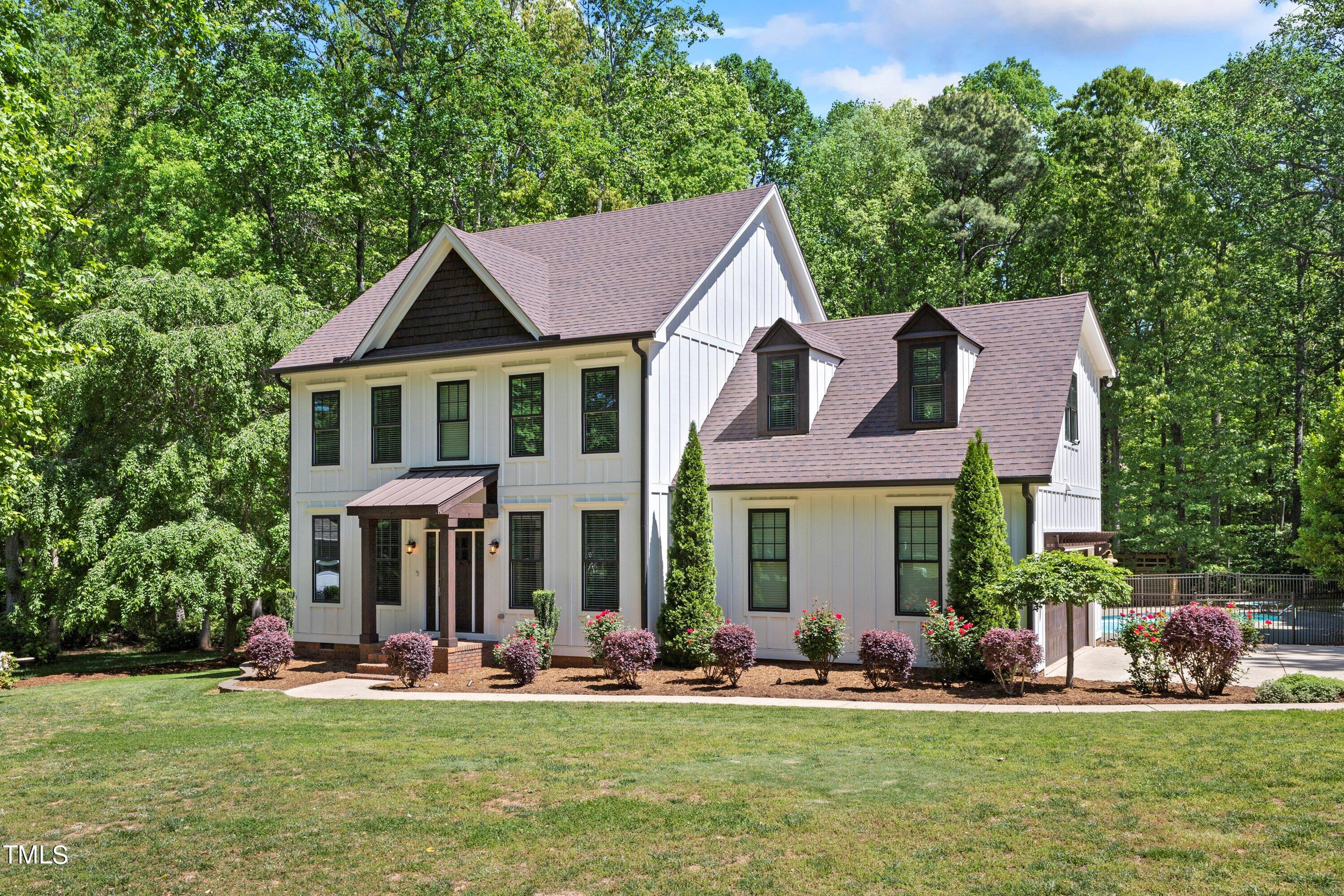 7408 Lakefall Drive Wake Forest, NC 27587 - Photo 62 of 65 front view of a house with a yard