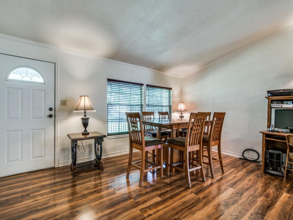 233 Esquire Estates Road Mabank, TX 75156 - Photo 4 of 34 Dining space with a textured wall, wood finished floors, and crown molding