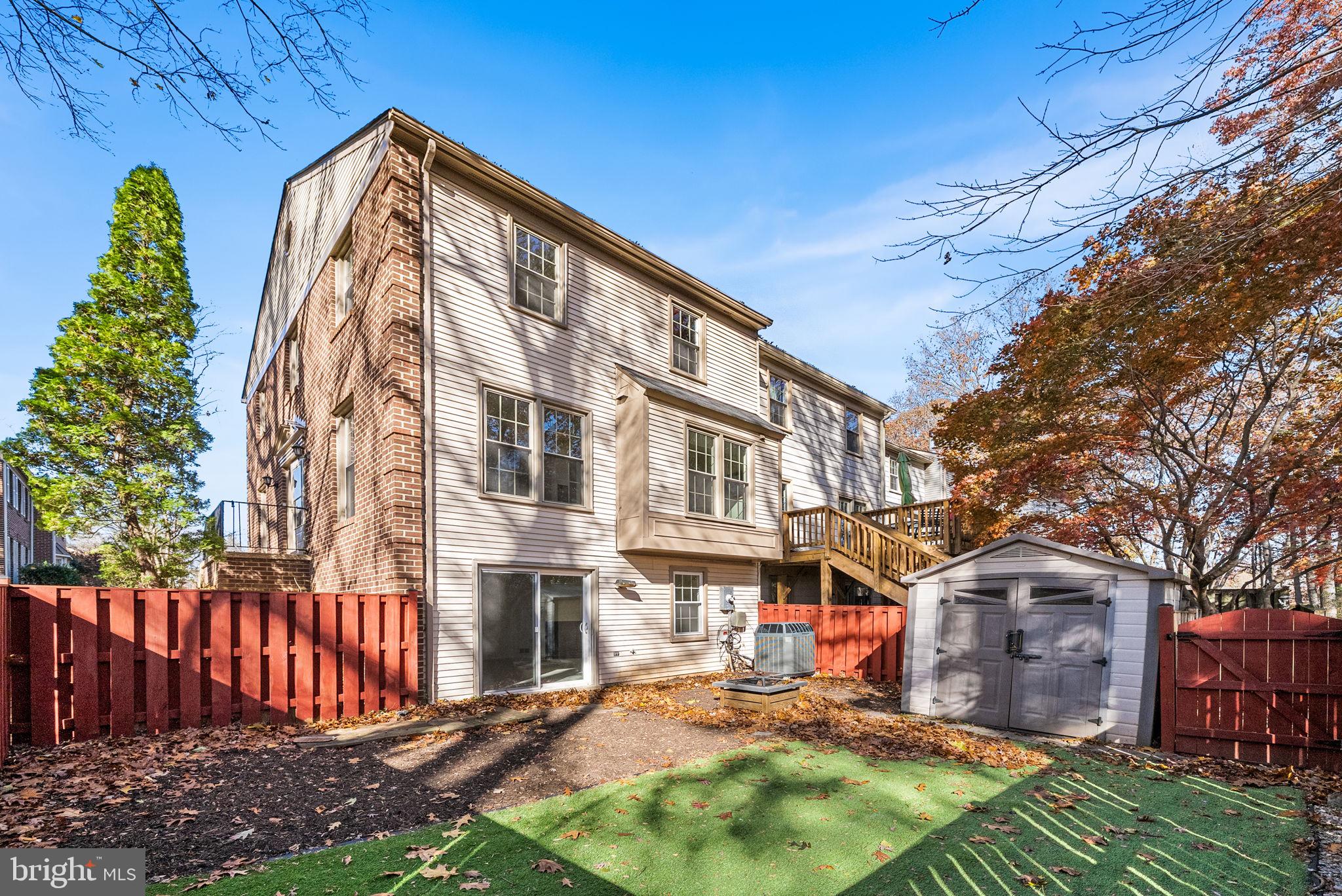 5658 Sutherland Court Burke, VA 22015 - Photo 25 of 30 a front view of a house with garden