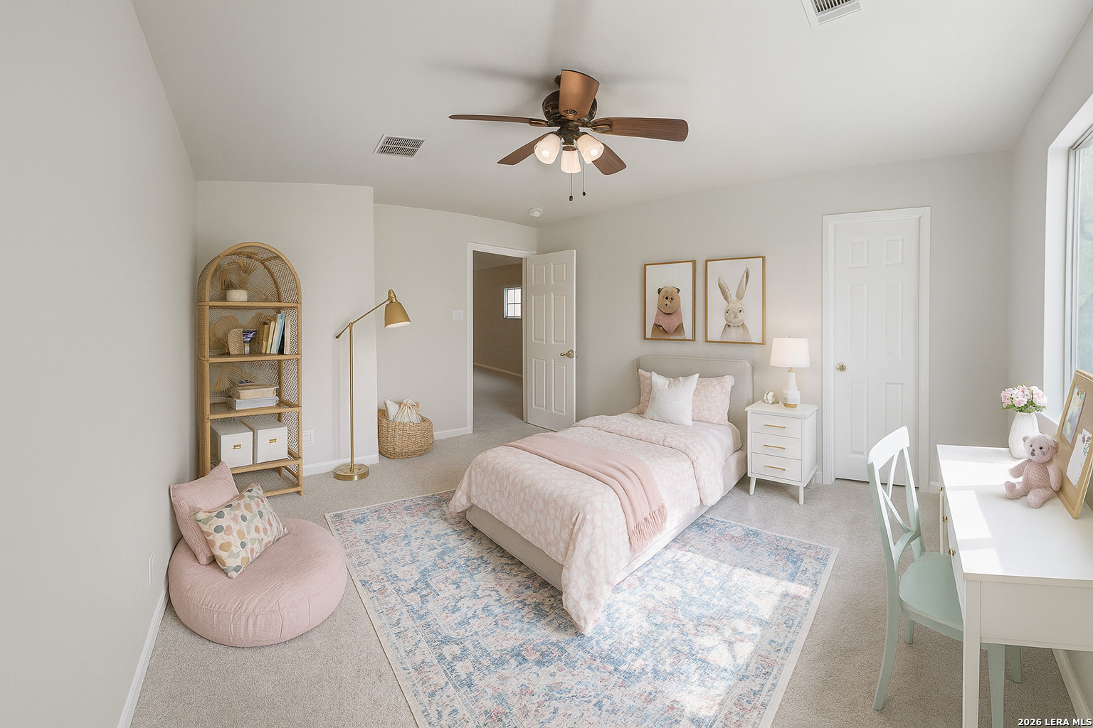 15603 Luna Ridge Helotes, TX 78023 - Photo 11 of 24 a spacious bedroom with a bed and ceiling fan