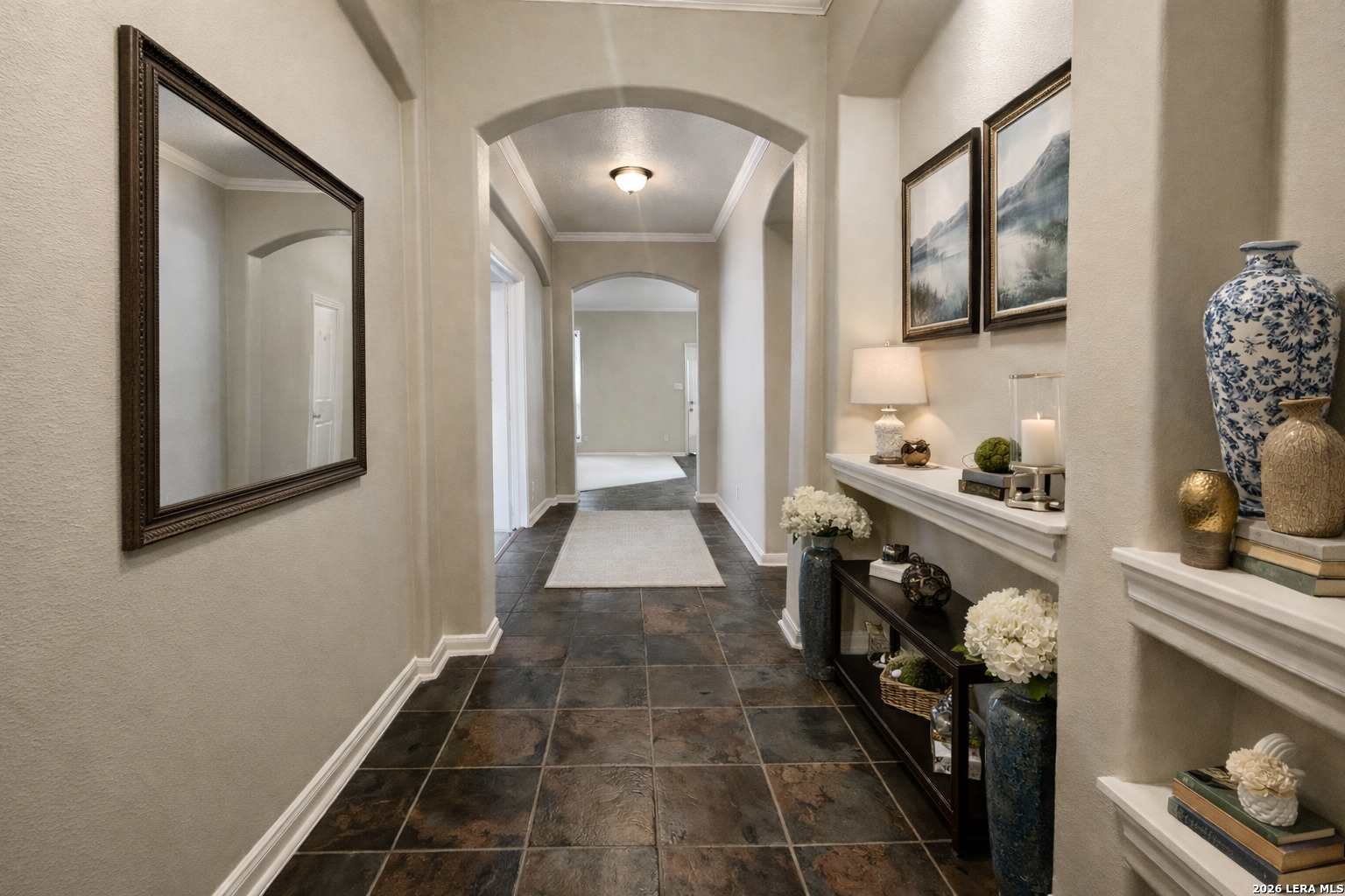 15603 Luna Ridge Helotes, TX 78023 - Photo 2 of 24 a hallway with cabinets