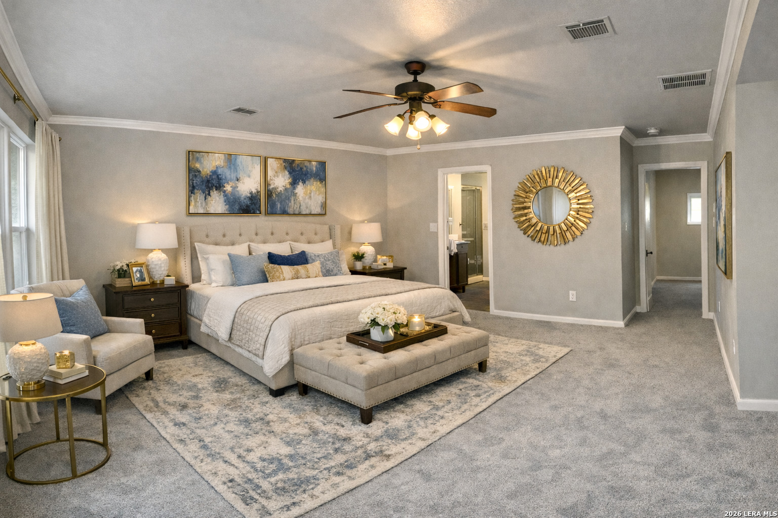 15603 Luna Ridge Helotes, TX 78023 - Photo 7 of 24 a bedroom with a bed and a chandelier