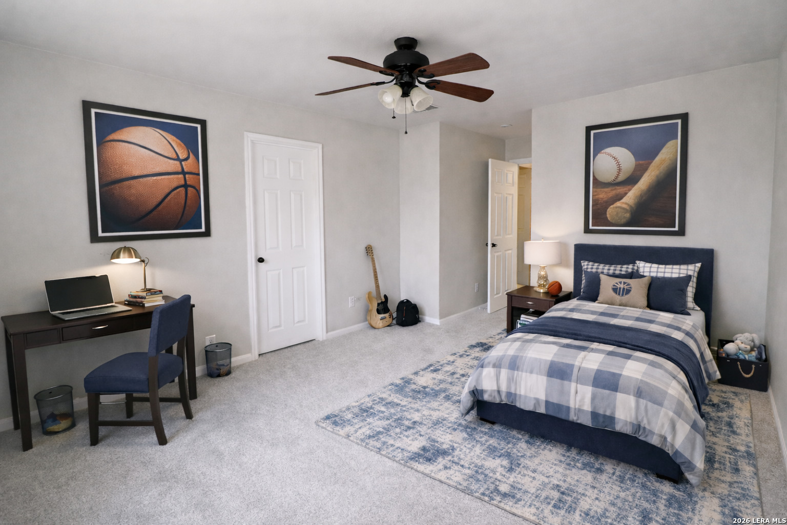 15603 Luna Ridge Helotes, TX 78023 - Photo 9 of 24 a bedroom with bed and a desk