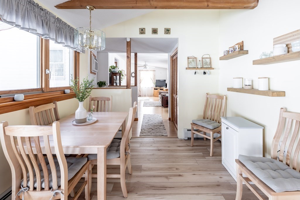 144 Main Road Montgomery, MA 01085 - Photo 8 of 36 a view of a dining room with furniture window and wooden floor