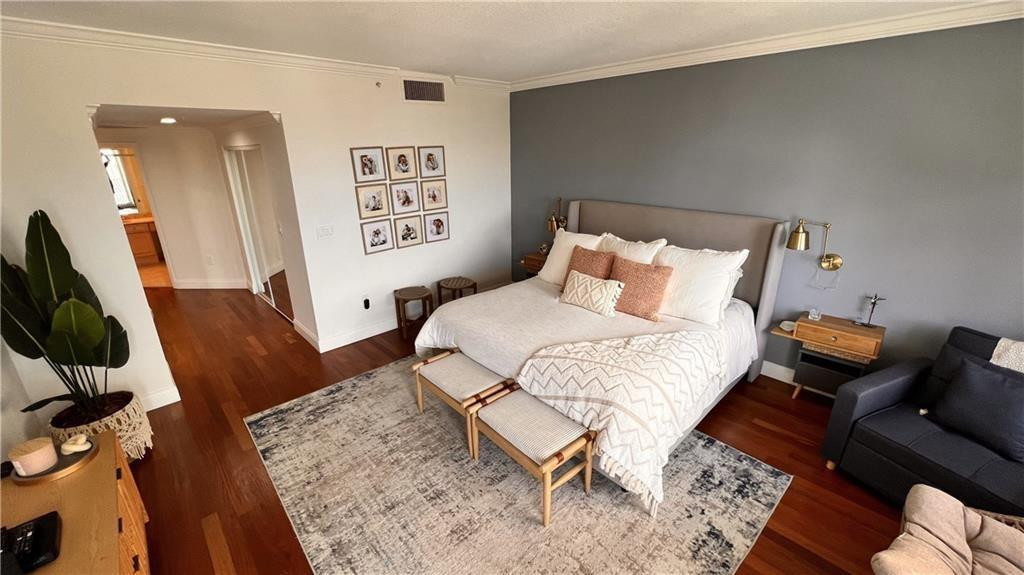 100 South Birch Road, Unit 1403F Fort Lauderdale, FL 33316 - Photo 27 of 31 a bedroom with a bed and furniture