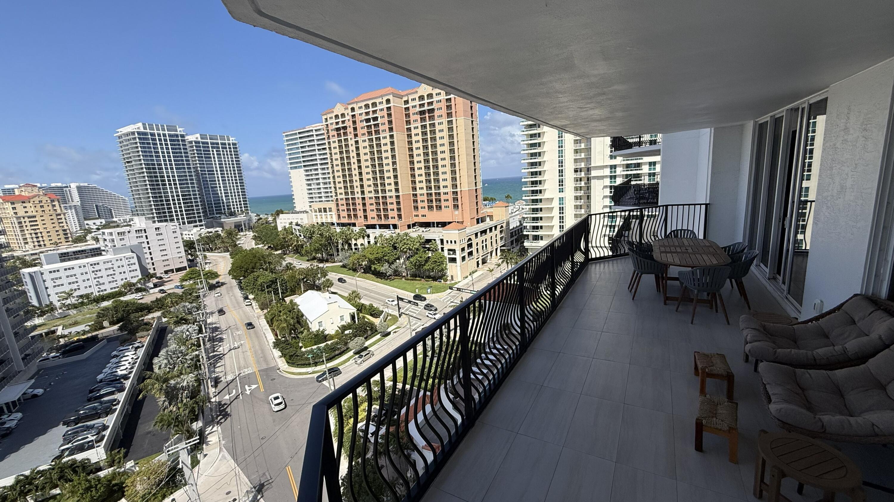 100 South Birch Road, Unit 1403F Fort Lauderdale, FL 33316 - Photo 29 of 31 a stair with table and chairs