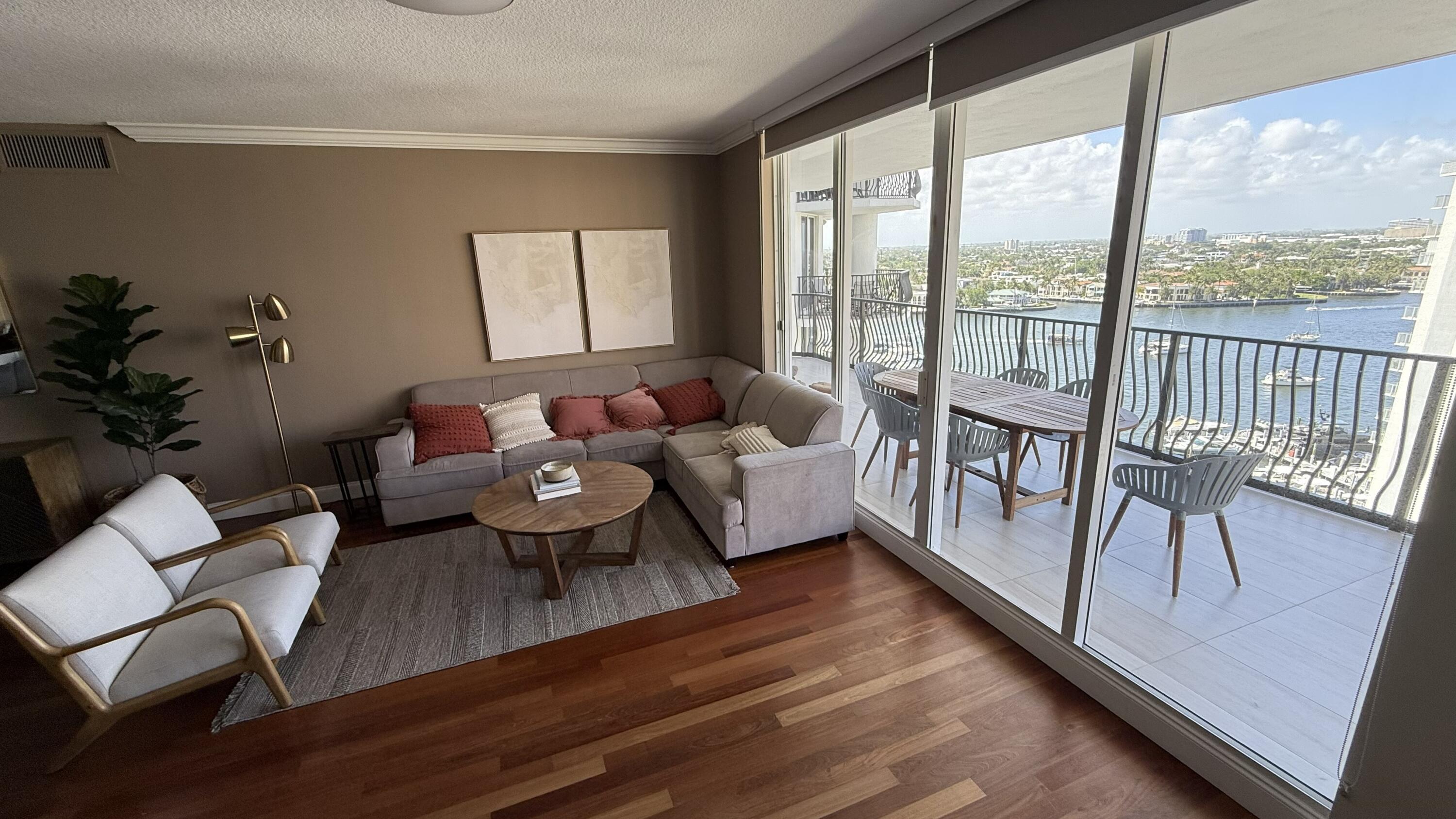 100 South Birch Road, Unit 1403F Fort Lauderdale, FL 33316 - Photo 31 of 31 a living room with furniture and a large window