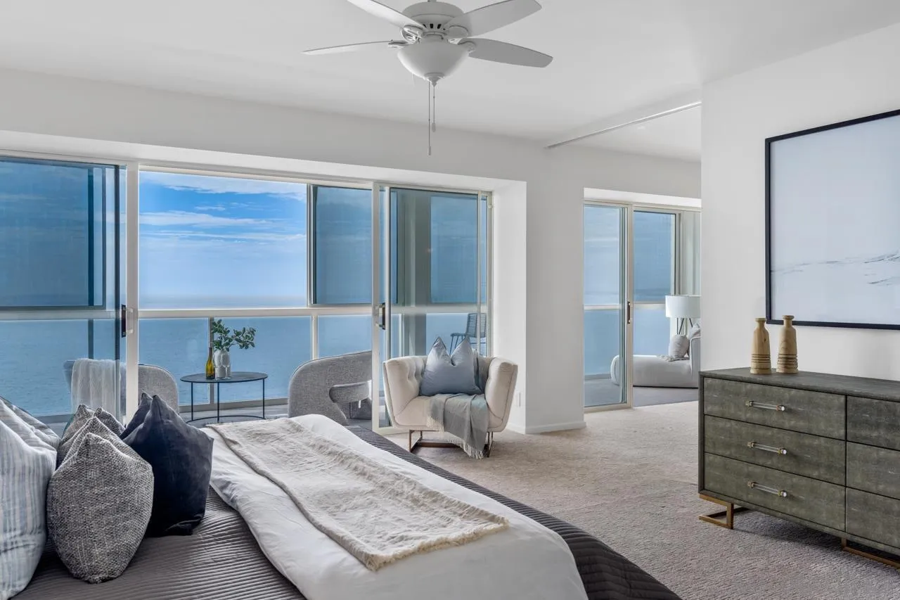 939 Coast Boulevard, Unit 20C La Jolla, CA 92037 - Photo 12 of 25 a bedroom with a bed and window