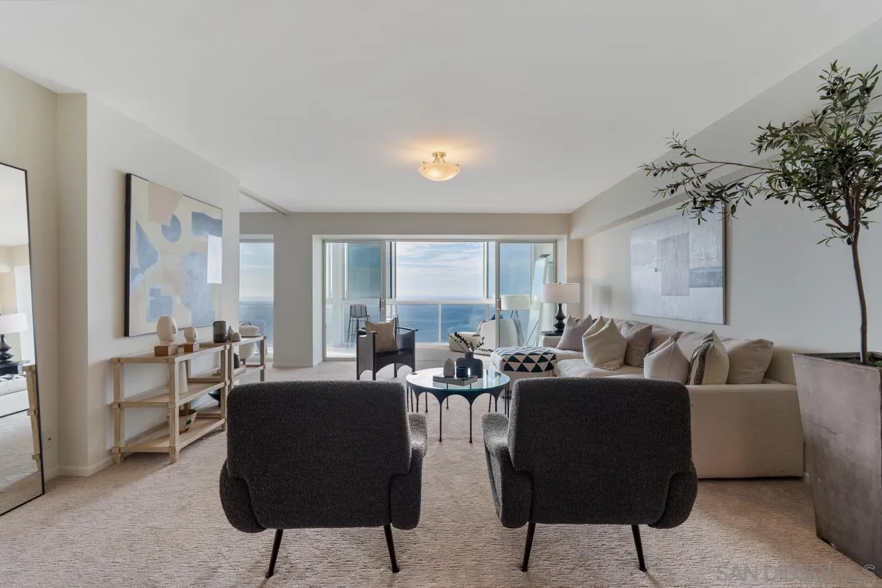 939 Coast Boulevard, Unit 20C La Jolla, CA 92037 - Photo 6 of 25 a living room with furniture and a large window