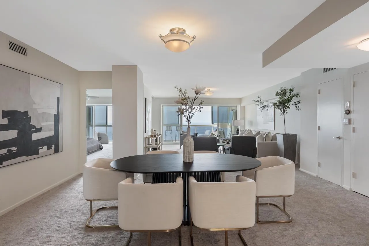939 Coast Boulevard, Unit 20C La Jolla, CA 92037 - Photo 10 of 25 a dining room with furniture and wooden floor