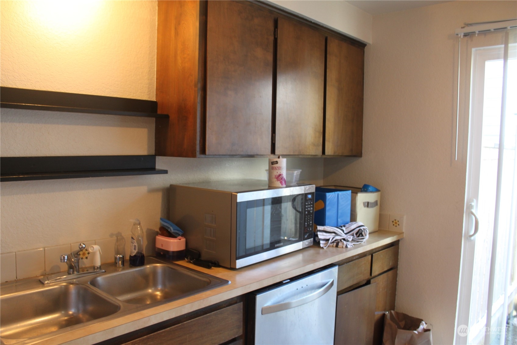 1729 Madison Street Everett, WA 98203 - Photo 13 of 32 a kitchen with a sink cabinets and stainless steel appliances