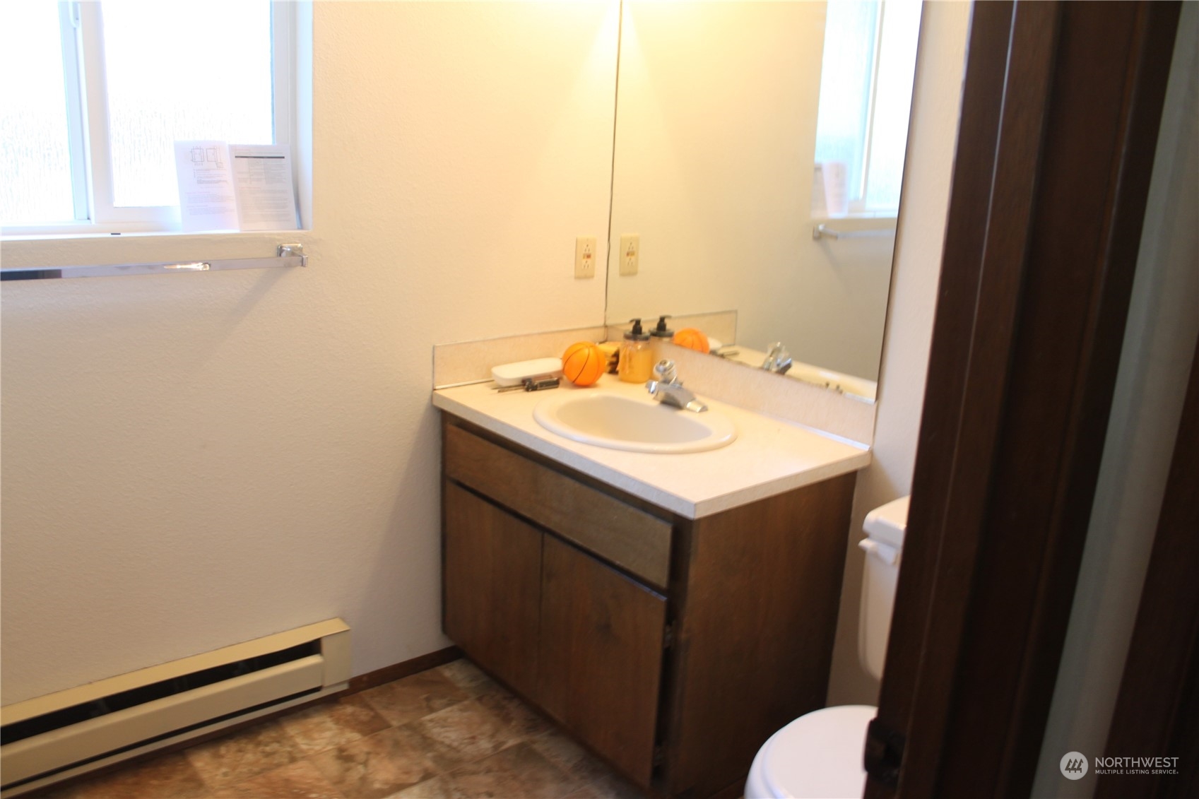 1729 Madison Street Everett, WA 98203 - Photo 17 of 32 a bathroom with a sink and a toilet