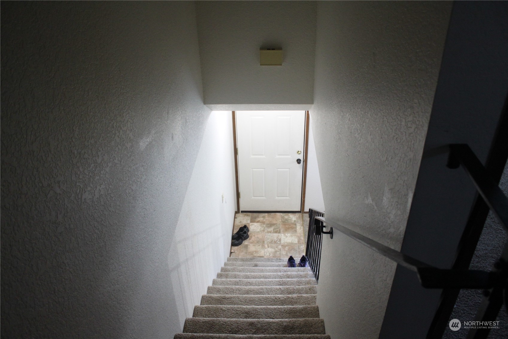 1729 Madison Street Everett, WA 98203 - Photo 21 of 32 a view of a hallway with wooden floor and staircase