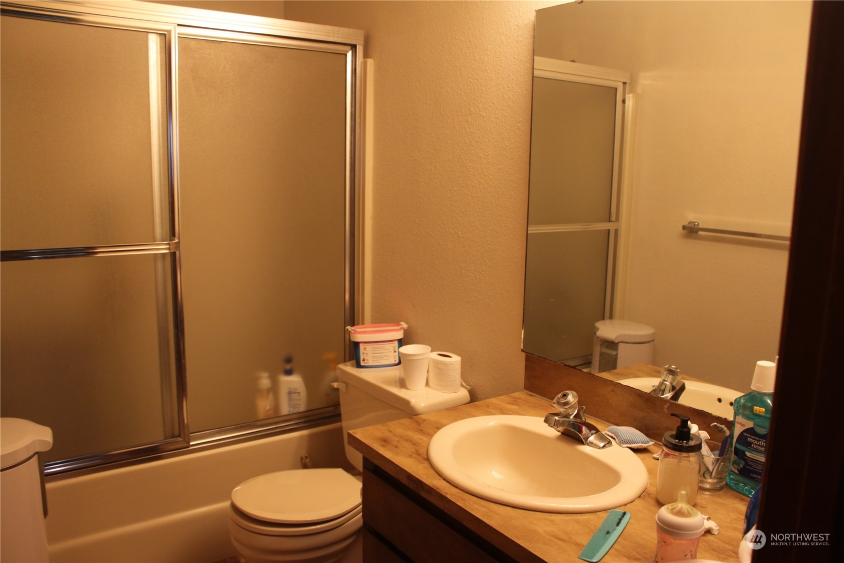 1729 Madison Street Everett, WA 98203 - Photo 23 of 32 a bathroom with a sink toilet and shower