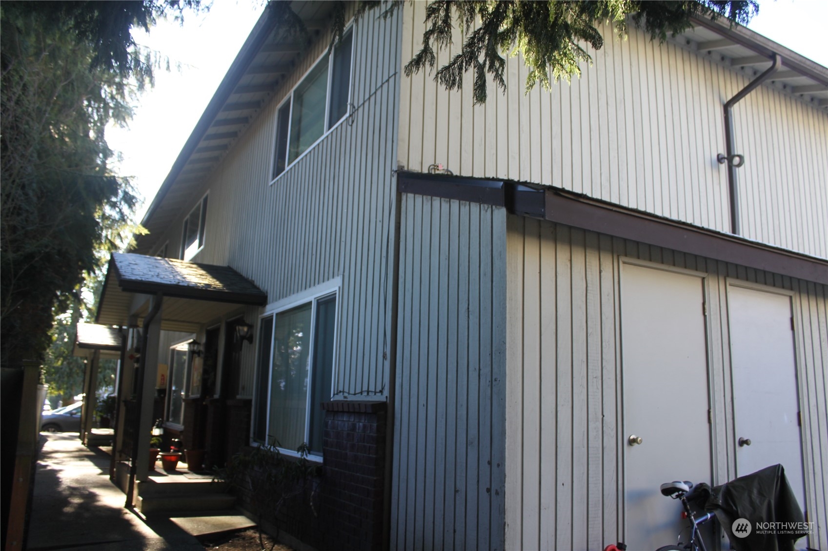 1729 Madison Street Everett, WA 98203 - Photo 25 of 32 a view of staircase with railing and a potted plant
