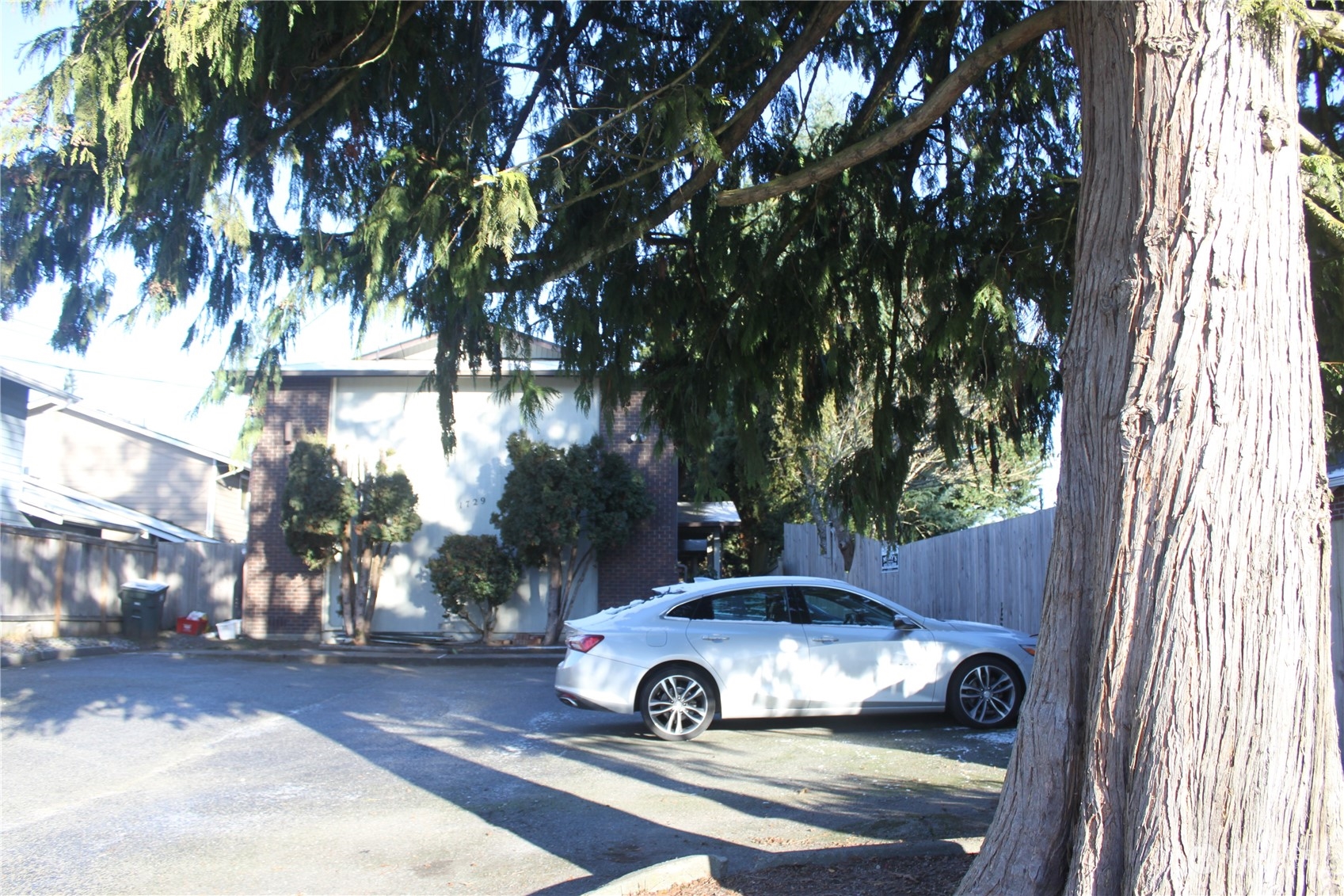 1729 Madison Street Everett, WA 98203 - Photo 28 of 32 a car parked in front of a house