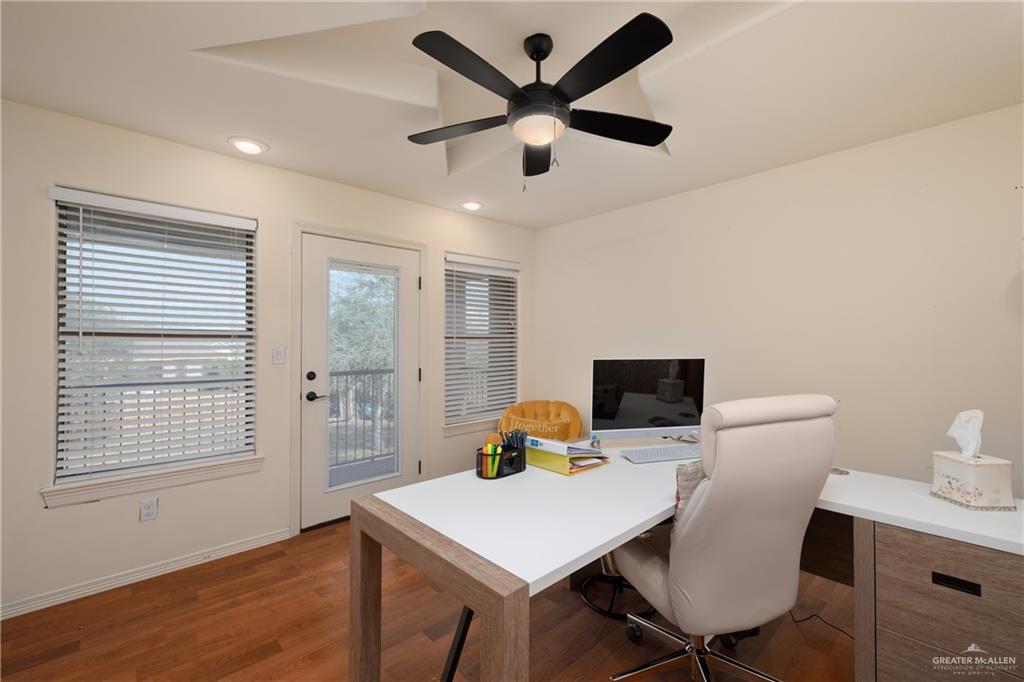 1502 Eucalyptus Street Weslaco, TX 78599 - Photo 16 of 24 a workspace with furniture and a window