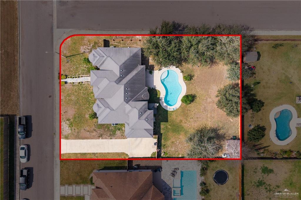 1502 Eucalyptus Street Weslaco, TX 78599 - Photo 19 of 24 an aerial view of a house with a swimming pool