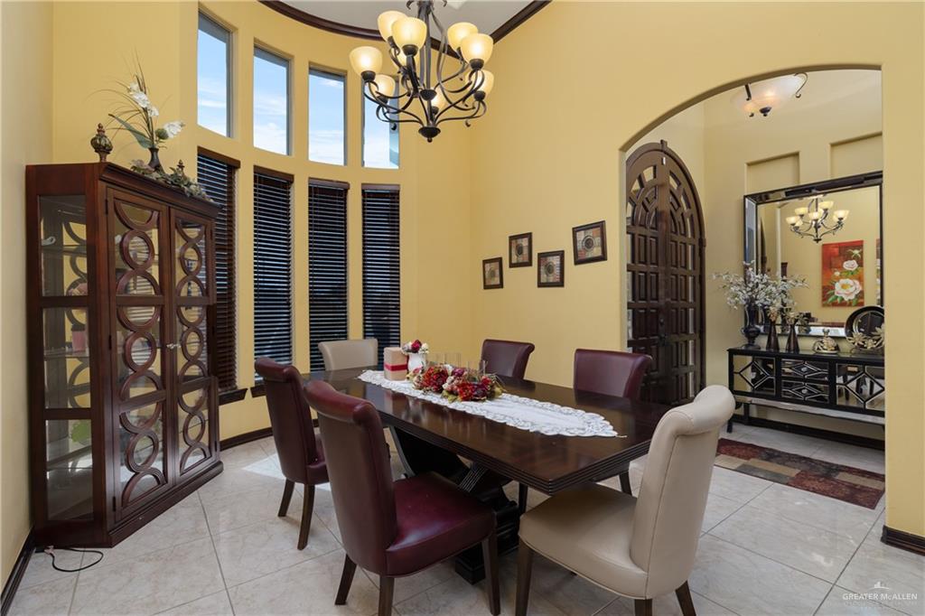 1502 Eucalyptus Street Weslaco, TX 78599 - Photo 5 of 24 a view of a dining room with furniture window and wooden floor