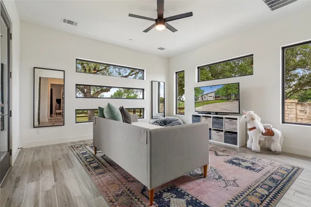 a kitchen with a sink appliances and cabinets