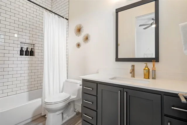 a bedroom with a bed and a couch