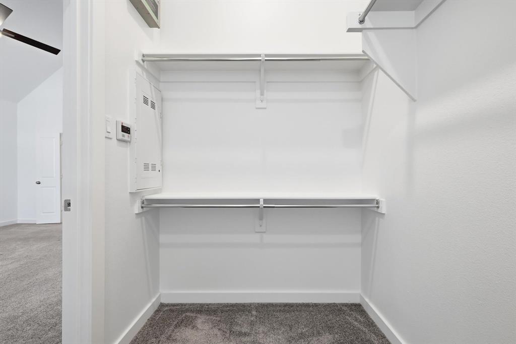 531 Cobblestone Lane Irving, TX 75039 - Photo 19 of 39 a view of an empty walk in closet