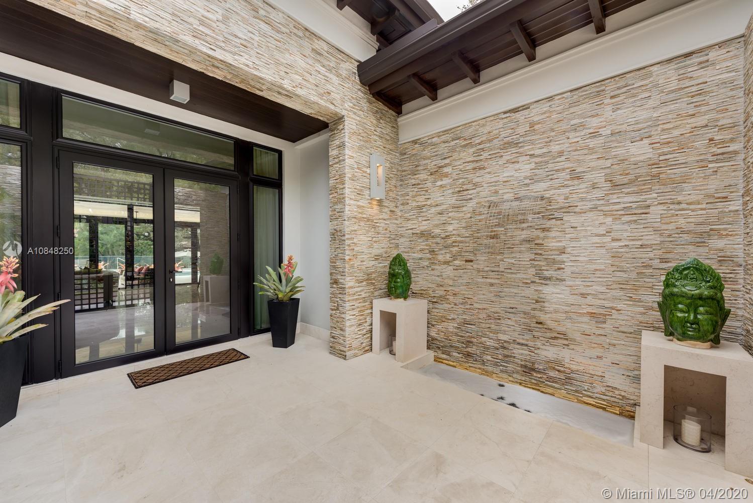810 Jeronimo Drive Coral Gables, FL 33146 - Photo 30 of 32 a view of a entryway door of the house