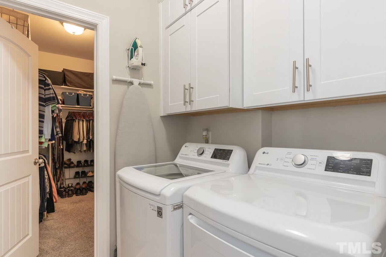 3508 Jones Lake Road Fuquay-Varina, NC 27526 - Photo 16 of 41 a utility room with dryer and washer